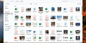 파이썬 파일 자동 정리 전 무질서한 윈도우 다운로드 폴더 화면